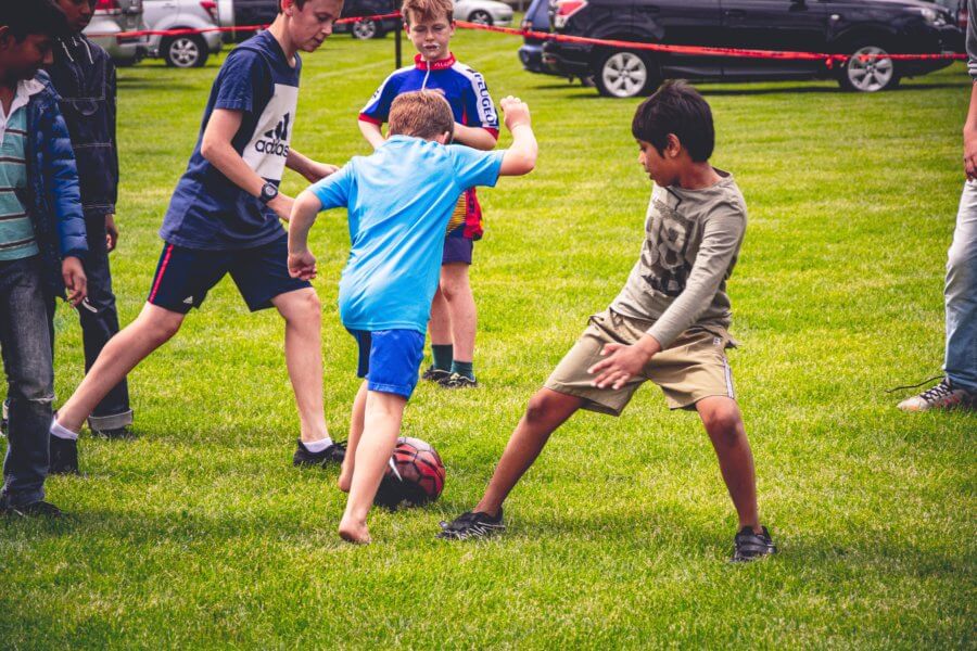 boy's playing soccer
